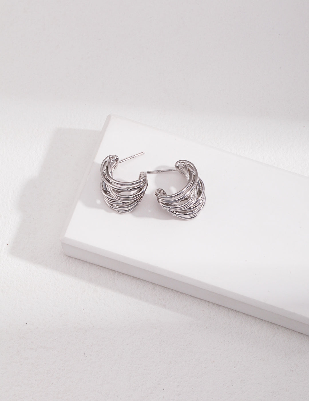 Whirlwind Grace Silver Hoop Earrings Amore Forma